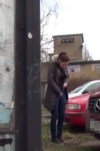 Outstanding Brunette Doll Pisses Behind A Schoolbus Stop